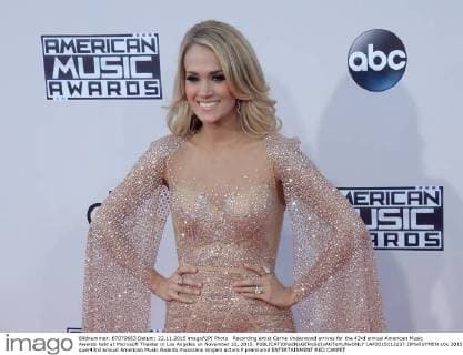 Recording artist Carrie Underwood arrives for the 43rd annual American Music Awards held at Microsoft Theater in Los Angeles on November 22, 2015.  LAP2015112237 JIMxRUYMEN