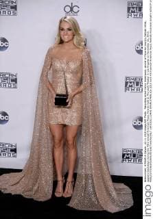 Recording artist Carrie Underwood, winner of Favorite Country Female Artist, appears backstage during the 43rd annual American Music Awards held at Microsoft Theater in Los Angeles on November 22, 2015.  LAP20151122433 JIMxRUYMEN