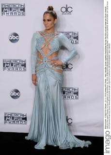 Host Jennifer Lopez appears backstage during the 43rd annual American Music Awards held at Microsoft Theater in Los Angeles on November 22, 2015.  LAP20151122458 JIMxRUYMEN