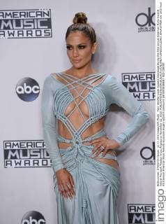 Host Jennifer Lopez appears backstage during the 43rd annual American Music Awards held at Microsoft Theater in Los Angeles on November 22, 2015.  LAP20151122463 JIMxRUYMEN
