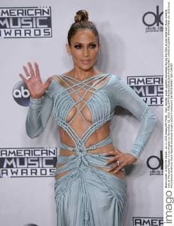 Host Jennifer Lopez appears backstage during the 43rd annual American Music Awards held at Microsoft Theater in Los Angeles on November 22, 2015.  LAP20151122464 JIMxRUYMEN