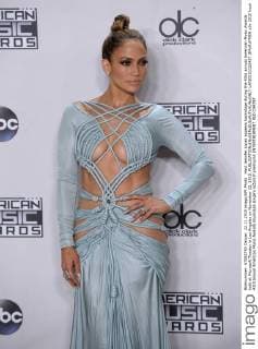 Host Jennifer Lopez appears backstage during the 43rd annual American Music Awards held at Microsoft Theater in Los Angeles on November 22, 2015.  LAP20151122457 JIMxRUYMEN