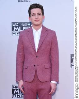 Nov. 22, 2015 - Los Angeles, California, U.S. - Charlie Puth arrives for the 2015 American Music Awards at the Microsoft theater. Los Angeles U.S. - ZUMAo05_