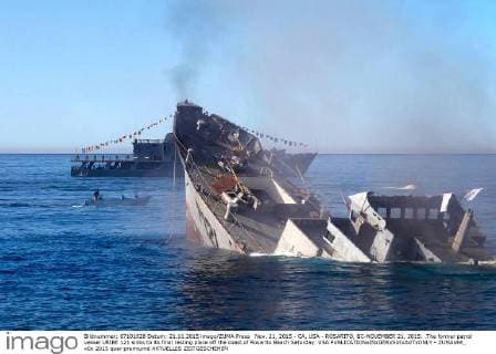 Nov. 21, 2015 - CA, USA - ROSARITO, BC-NOVEMBER 21, 2015: .The former patrol vessel URIBE 121 sinks to its final resting place off the coast of Rosarito Beach Saturday. USA - ZUMAs44_