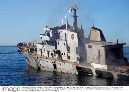 Nov. 21, 2015 - CA, USA - ROSARITO, BC-NOVEMBER 21, 2015: .The former patrol vessel URIBE 121 sinks to its final resting place off the coast of Rosarito Beach Saturday. USA - ZUMAs44_
