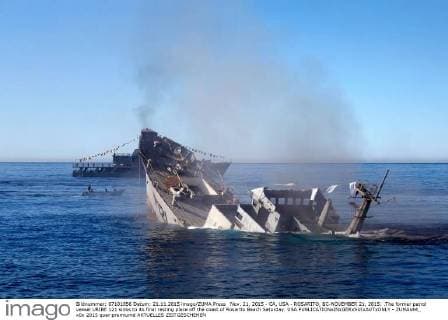 Nov. 21, 2015 - CA, USA - ROSARITO, BC-NOVEMBER 21, 2015: .The former patrol vessel URIBE 121 sinks to its final resting place off the coast of Rosarito Beach Saturday. USA - ZUMAs44_