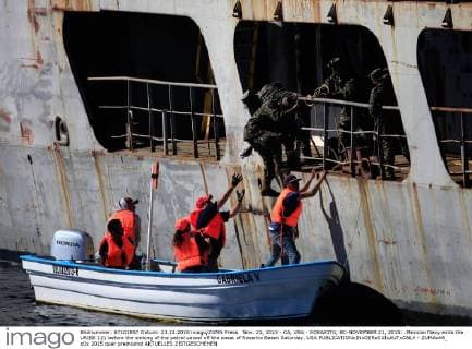 Nov. 23, 2015 - CA, USA - ROSARITO, BC-NOVEMBER 21, 2015: .Mexican Navy exits the URIBE 121 before the sinking of the patrol vessel off the coast of Rosarito Beach Saturday. USA - ZUMAs44_