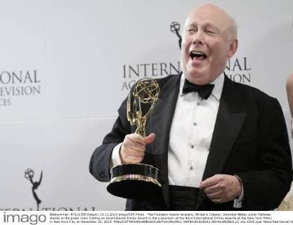 The Founders Award recipient, Writer & Creator, Downton Abbey Julian Fellowes stands in the press room holding an International Emmy Award in the pressroom at the 43rd International Emmy Awards at the New York Hilton in New York City on November 23, 2015.  NYP20151123152 JOHNxANGELILLO