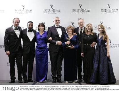 Award Winners for Non-Scripted Entertainment for 50 Ways To Kill Your Mammy including Baz Ashmawy, Executive Producer and Nancy Ashmawy, Principal Cast celebrate with Presenters Holly Taylor (R) and Joel Benoliel in the pressroom at the 43rd International Emmy Awards at the New York Hilton in New York City on November 23, 2015.  NYP20151123156 JOHNxANGELILLO