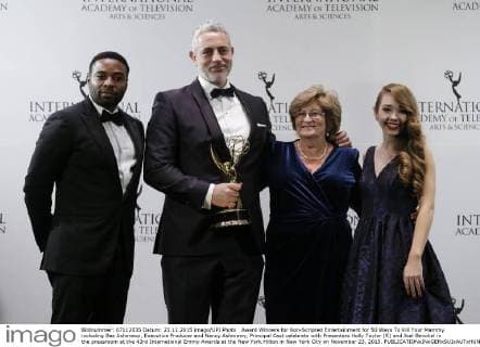 Award Winners for Non-Scripted Entertainment for 50 Ways To Kill Your Mammy including Baz Ashmawy, Executive Producer and Nancy Ashmawy, Principal Cast celebrate with Presenters Holly Taylor (R) and Joel Benoliel in the pressroom at the 43rd International Emmy Awards at the New York Hilton in New York City on November 23, 2015.  NYP20151123157 JOHNxANGELILLO
