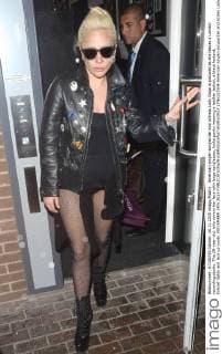 American singer-songwriter and actress Lady Gaga is pictured as she leaves a London recording studio. The 29-year-old, who covers her face with large sunglasses, looks punky wearing a leather jacket, a black leotard, fishnet tights and lace up boots. NOVEMBER 24th 2015  LTNx153504