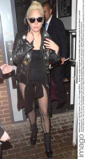 American singer-songwriter and actress Lady Gaga is pictured as she leaves a London recording studio. The 29-year-old, who covers her face with large sunglasses, looks punky wearing a leather jacket, a black leotard, fishnet tights and lace up boots. NOVEMBER 24th 2015  LTNx153504