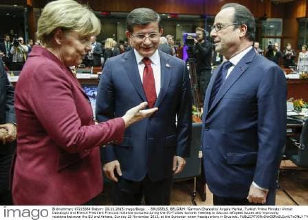 - BRUSSELS, BELGIUM: German Chancellor Angela Merkel, Turkish Prime Minister Ahmet Davutoglu and French President Francois Hollande pictured during the EU-Turkey summit meeting to discuss refugees issues and improving relations between the EU and Ankara, Sunday 29 November 2015, at the European union headquarters in Brussels.  THIERRYxROGE 04749041