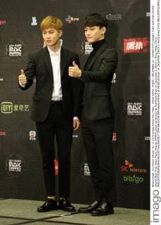 HONG KONG, CHINA - DECEMBER 02: (CHINA OUT) Singers Suho and Chen of EXO attend 2015 Mnet Asian Music Awards (MAMA) press conference at AsiaWorld-Expo on December 2, 2015 in Hong Kong, China.  CFP476633229