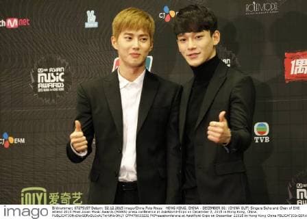 HONG KONG, CHINA - DECEMBER 02: (CHINA OUT) Singers Suho and Chen of EXO attend 2015 Mnet Asian Music Awards (MAMA) press conference at AsiaWorld-Expo on December 2, 2015 in Hong Kong, China.  CFP476633232