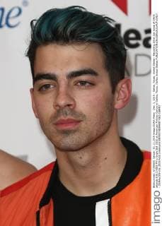 Dec. 1, 2015 - Dallas, Texas, United States - Recording artist Joe Jonas of DNCE attends 106.1 KISS FM s Jingle Ball 2015 at American Airlines Center in Dallas, Texas. Dallas United States - ZUMAw109