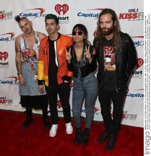 Dec. 1, 2015 - Dallas, Texas, United States - (L-R) Recording artists Cole Whittle, Joe Jonas, JinJoo Lee and Jack Lawless of DNCE attend 106.1 KISS FM s Jingle Ball 2015 at American Airlines Center in Dallas, Texas. Dallas United States - ZUMAw109