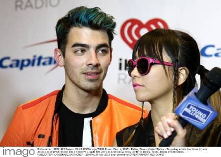 Dec. 1, 2015 - Dallas, Texas, United States - Recording artists Joe Jonas (L) and JinJoo Lee of DNCE attend 106.1 KISS FM s Jingle Ball 2015 at American Airlines Center in Dallas, Texas. Dallas United States - ZUMAw109