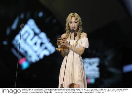 HONG KONG, CHINA - DECEMBER 02: (CHINA OUT) Singer Kim Tae-yeon of Girls Generation performs on the stage during the 2015 Mnet Asian Music Awards (MAMA) at AsiaWorld-Expo on December 2, 2015 in Hong Kong, China.  CFP476670913