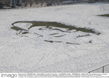 CHANGCHUN, CHINA - DECEMBER 08: (CHINA OUT) Two students make a portrait of actress Marilyn Monroe on a snow-covered playground at Changchun University of Technology on December 8, 2015 in Changchun, Jilin Province of China. The two students spent two days making the portrait.  CFP476909311