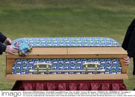 Dec. 10, 2015 - Toronto, ON, Canada - TORONTO, ON - DECEMBER 10 - The casket of seven-year-old Evan Leversage, at St. George Cemetery in St. George, Ontario, December 10, 2015. Evan, who battled brain cancer for most of his young life, made headlines internationally when homes and businesses in the Ontario town put their Christmas decorations up in October, after doctors told his family he was unlikely to live to Christmas and they should celebrate early. Toronto Canada - ZUMAt14_