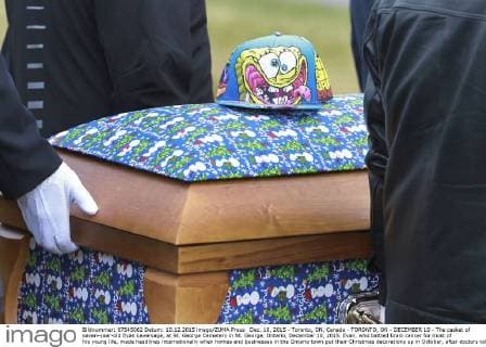 Dec. 10, 2015 - Toronto, ON, Canada - TORONTO, ON - DECEMBER 10 - The casket of seven-year-old Evan Leversage, at St. George Cemetery in St. George, Ontario, December 10, 2015. Evan, who battled brain cancer for most of his young life, made headlines internationally when homes and businesses in the Ontario town put their Christmas decorations up in October, after doctors told his family he was unlikely to live to Christmas and they should celebrate early. Toronto Canada - ZUMAt14_