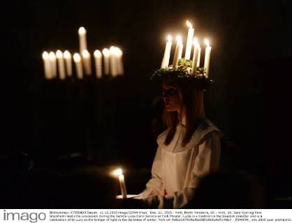 Dec. 11, 2015 - York, North Yorkshire, UK - York, UK. Sara Kjorling from Stockholm leads the procession during the Sankta Lucia Carol Service at York Minster. Lucia is a tradition in the Swedish calendar and is a celebration of St Lucy as the bringer of light in the darkness of winter. York UK  - ZUMAl94_