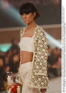 Dec. 11, 2015 - Lahore, Punjab, Pakistan - Pakistani models present creations by famous designer HSY, Shazia Kiyani, Aisha Imran, Zarmisha Dar on the first day of the Telenor Fashion Bridal Couture Week in Lahore. Lahore Pakistan - ZUMAp133