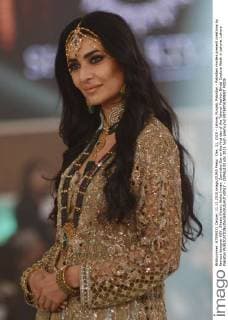 Dec. 11, 2015 - Lahore, Punjab, Pakistan - Pakistani models present creations by famous designer HSY, Shazia Kiyani, Aisha Imran, Zarmisha Dar on the first day of the Telenor Fashion Bridal Couture Week in Lahore. Lahore Pakistan - ZUMAp133