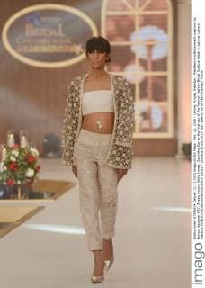 Dec. 11, 2015 - Lahore, Punjab, Pakistan - Pakistani models present creations by famous designer HSY, Shazia Kiyani, Aisha Imran, Zarmisha Dar on the first day of the Telenor Fashion Bridal Couture Week in Lahore. Lahore Pakistan - ZUMAp133