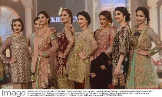 Dec. 11, 2015 - Lahore, Punjab, Pakistan - Pakistani models present creations by famous designer HSY, Shazia Kiyani, Aisha Imran, Zarmisha Dar on the first day of the Telenor Fashion Bridal Couture Week in Lahore. Lahore Pakistan - ZUMAp133