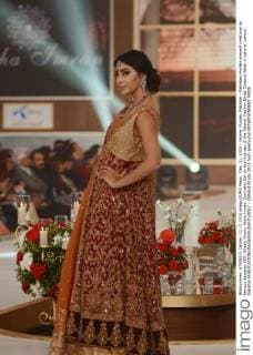 Dec. 11, 2015 - Lahore, Punjab, Pakistan - Pakistani models present creations by famous designer HSY, Shazia Kiyani, Aisha Imran, Zarmisha Dar on the first day of the Telenor Fashion Bridal Couture Week in Lahore. Lahore Pakistan - ZUMAp133