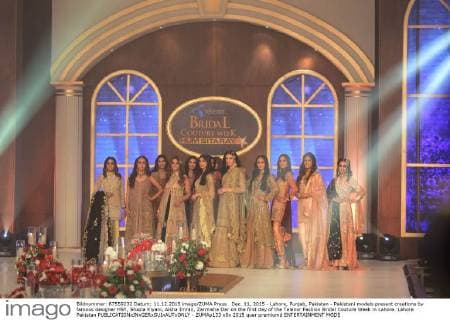 Dec. 11, 2015 - Lahore, Punjab, Pakistan - Pakistani models present creations by famous designer HSY, Shazia Kiyani, Aisha Imran, Zarmisha Dar on the first day of the Telenor Fashion Bridal Couture Week in Lahore. Lahore Pakistan - ZUMAp133