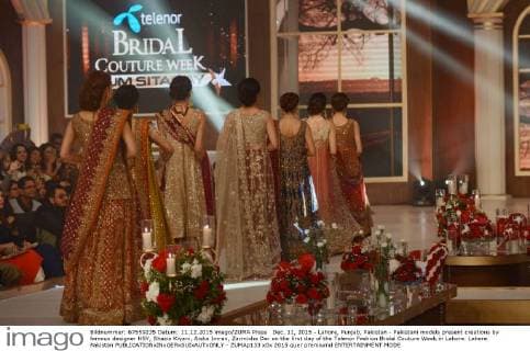 Dec. 11, 2015 - Lahore, Punjab, Pakistan - Pakistani models present creations by famous designer HSY, Shazia Kiyani, Aisha Imran, Zarmisha Dar on the first day of the Telenor Fashion Bridal Couture Week in Lahore. Lahore Pakistan - ZUMAp133