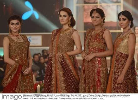 Dec. 11, 2015 - Lahore, Punjab, Pakistan - Pakistani models present creations by famous designer HSY, Shazia Kiyani, Aisha Imran, Zarmisha Dar on the first day of the Telenor Fashion Bridal Couture Week in Lahore. Lahore Pakistan - ZUMAp133