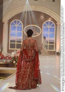 Dec. 11, 2015 - Lahore, Punjab, Pakistan - Pakistani models present creations by famous designer HSY, Shazia Kiyani, Aisha Imran, Zarmisha Dar on the first day of the Telenor Fashion Bridal Couture Week in Lahore. Lahore Pakistan - ZUMAp133