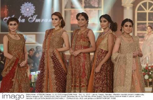 Dec. 11, 2015 - Lahore, Punjab, Pakistan - Pakistani models present creations by famous designer HSY, Shazia Kiyani, Aisha Imran, Zarmisha Dar on the first day of the Telenor Fashion Bridal Couture Week in Lahore. Lahore Pakistan - ZUMAp133