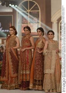 Dec. 11, 2015 - Lahore, Punjab, Pakistan - Pakistani models present creations by famous designer HSY, Shazia Kiyani, Aisha Imran, Zarmisha Dar on the first day of the Telenor Fashion Bridal Couture Week in Lahore. Lahore Pakistan - ZUMAp133