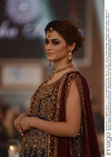 Dec. 11, 2015 - Lahore, Punjab, Pakistan - Pakistani models present creations by famous designer HSY, Shazia Kiyani, Aisha Imran, Zarmisha Dar on the first day of the Telenor Fashion Bridal Couture Week in Lahore. Lahore Pakistan - ZUMAp133