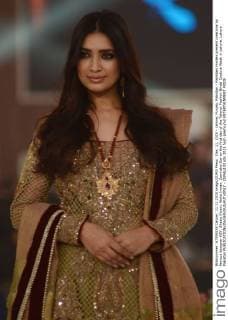 Dec. 11, 2015 - Lahore, Punjab, Pakistan - Pakistani models present creations by famous designer HSY, Shazia Kiyani, Aisha Imran, Zarmisha Dar on the first day of the Telenor Fashion Bridal Couture Week in Lahore. Lahore Pakistan - ZUMAp133