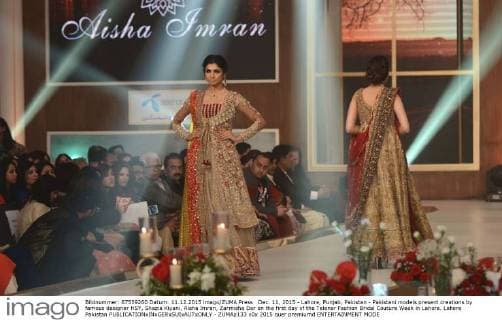 Dec. 11, 2015 - Lahore, Punjab, Pakistan - Pakistani models present creations by famous designer HSY, Shazia Kiyani, Aisha Imran, Zarmisha Dar on the first day of the Telenor Fashion Bridal Couture Week in Lahore. Lahore Pakistan - ZUMAp133