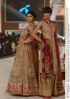 Dec. 11, 2015 - Lahore, Punjab, Pakistan - Pakistani models present creations by famous designer HSY, Shazia Kiyani, Aisha Imran, Zarmisha Dar on the first day of the Telenor Fashion Bridal Couture Week in Lahore. Lahore Pakistan - ZUMAp133