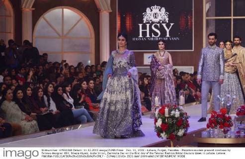 Dec. 11, 2015 - Lahore, Punjab, Pakistan - Pakistani models present creations by famous designer HSY, Shazia Kiyani, Aisha Imran, Zarmisha Dar on the first day of the Telenor Fashion Bridal Couture Week in Lahore. Lahore Pakistan - ZUMAp133