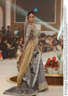 Dec. 11, 2015 - Lahore, Punjab, Pakistan - Pakistani models present creations by famous designer HSY, Shazia Kiyani, Aisha Imran, Zarmisha Dar on the first day of the Telenor Fashion Bridal Couture Week in Lahore. Lahore Pakistan - ZUMAp133