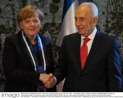 Feb. 25, 2014 - Jerusalem, Israel - Israeli President SHIMON PERES confers the Presidential Medal of Distinction upon Chancellor ANGELA MERKEL for her unwavering commitment to Israel s security and the fight against anti-Semitism . The medal, awarded for unique and outstanding contributions to Tikkun Olam , bettering the world, the highest civilian award in Israel, was previously bestowed upon U.S. Presidents Clinton and Obama. - ZUMAa12