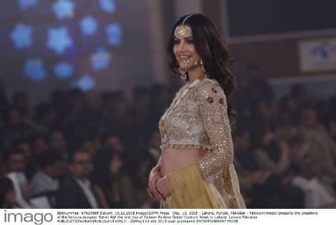 Dec. 13, 2015 - Lahore, Punjab, Pakistan - Pakistani model presents the creations of the famous designer Sahar Atif the last day of Telenor Fashion Bridal Couture Week in Lahore. Lahore Pakistan - ZUMAp133