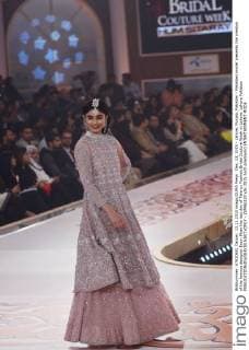 Dec. 13, 2015 - Lahore, Punjab, Pakistan - Pakistani model presents the creation of the famous designer Erum Khan the last day of Telenor Fashion Bridal Couture Week in Lahore. Lahore Pakistan - ZUMAp133