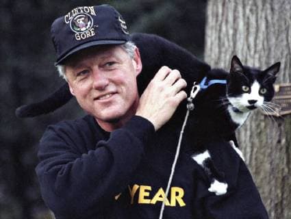 Dec. 20, 1993 - Washington, DC, United States of America - US President Bill Clinton walks with his cat Socks on his shoulder on the South Lawn of the Washington United States of America - ZUMAp138