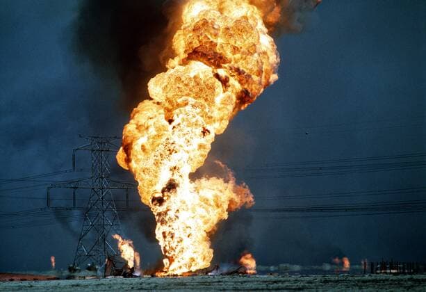 Feb. 27, 1991 - Ahman Oil Fields, KUWAIT - Blazing oil wells in the aftermath of Operation Desert Storm February 27, 1991 in the Ahman Oil Fields, Kuwait. The wells were set on fire by Iraqi forces before they were ousted from the region by coalition force. Ahman Oil Fields KUWAIT - ZUMAp138