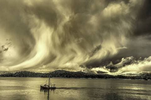 Scenic shot of Angel Clouds and salmon troller in the winter time Prince Rupert, British Columbia, Canada  acp87789 EvanxSpellman